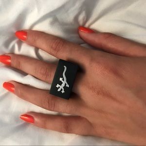 Black ring with silver lizard